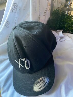 The Classic Black Snapback Hat with White XO Embroidery